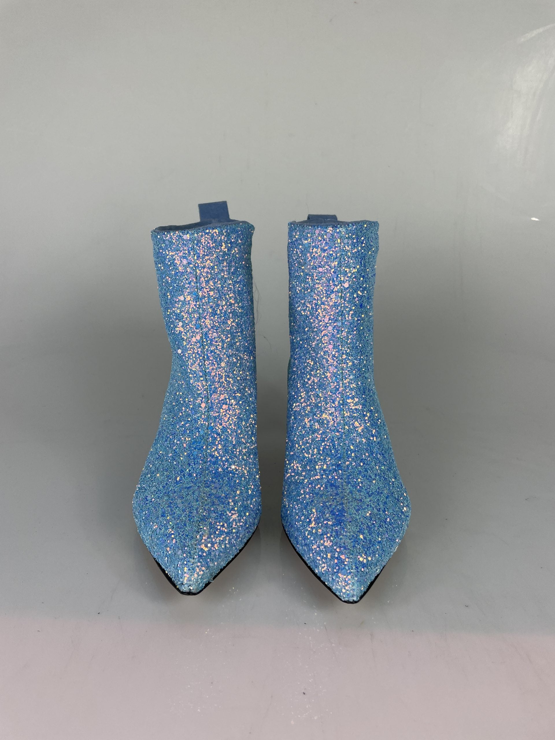 Light blue glitter flame